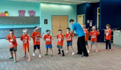 Mr. Nelson volunteers a martial arts class at Harvest Bible Chapel High Five camp, Elgin, IL