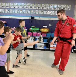 Mr. Roller teaching Bully Protection Seminar in a Elementary School